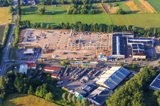 Aerial view of Construction site of the new logistics park of HANSAINVEST and DFI-Real-Estate Kandel after demolition of the OBI market in the district Minderslachen in Kandel in the state Rhineland-Palatinate, Germany