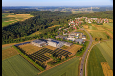 Aerial view of Open-space PV system at the Eferenstraße industrial estate with rio-sys and Gebr. Schwarz GmbH in the district Neukirch in Rottweil in the state Baden-Wuerttemberg, Germany