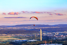 Paragliders in front of the TK Elevator test tower in Rottweil in the state Baden-Wuerttemberg, Germany