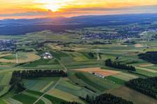Aerial view of Sunset over the Black Forest with wind turbines in the district Waldmössingen in Schramberg in the state Baden-Wuerttemberg, Germany