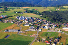View of the town from the northeast with Hess Montagen & Bauelemente GmbH / Holzbau GmbH & Co.KG and Herzog Treppen und Holzbau GmbH in Aichhalden in the state Baden-Wuerttemberg, Germany
