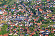 Town center with St. Martinus Church, Wehle sports hall and Volksbank Schwarzwald-Donau-Neckar eG in Dunningen in the state Baden-Wuerttemberg, Germany