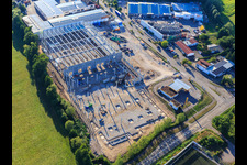 Bird's eye view of Construction site of the new logistics park of HANSAINVEST and DFI-Real-Estate Kandel after demolition of the OBI market in the district Minderslachen in Kandel in the state Rhineland-Palatinate, Germany