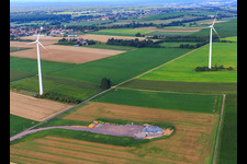 Repowering Wind Farm Minfeld. JUWI replaces four old turbines (GE 1.5) from 2004 with two new, modern Vestas V162 turbines, each with six megawatts. in Minfeld in the state Rhineland-Palatinate, Germany out of the air