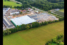 Aerial view of Construction site for the new logistics park of HANSAINVEST and DFI-Real-Estate Kandel after demolition of the OBI market in the district Minderslachen in Kandel in the state Rhineland-Palatinate, Germany