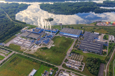 Aerial view of Steaming chimneys of the Palm GmbH & Co. KG paper mill | Plant Wörth am Rhein at the Wörth harbor from the northwest in Wörth am Rhein in the state Rhineland-Palatinate, Germany