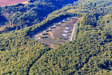Open-air PV system in a forest clearing in the district Büschfeld in Wadern in the state Saarland, Germany