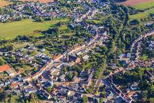 Trierer Straße with Catholic Church of the Visitation of Mary in Heusweiler in the state Saarland, Germany