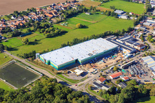 Drone image of Construction site of the new logistics park of HANSAINVEST and DFI-Real-Estate Kandel after demolition of the OBI market in the district Minderslachen in Kandel in the state Rhineland-Palatinate, Germany