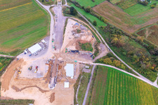 Construction site of the eastern tunnel portal for the Astrid Tunnel for the underpass and bypass of Bad Bergzabern between B38 (Weinstraße) and B427 (Kurtalstraße) in Dörrenbach in the state Rhineland-Palatinate, Germany from above