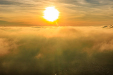 Sunset above the clouds in Steinfeld in the state Rhineland-Palatinate, Germany
