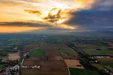 Sunset over the clouds from the east in the evening in Steinfeld in the state Rhineland-Palatinate, Germany