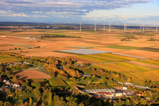Oblique view of Geothermal power plant Insheim for lithium extraction by Vulcan Energy GmbH in the background Rig V20 of Vercana GmbH and the Offenbach wind farm in Insheim in the state Rhineland-Palatinate, Germany