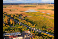 Geothermal power plant Insheim for lithium extraction by Vulcan Energy GmbH in the background Rig V20 of Vercana GmbH and the Offenbach wind farm in Insheim in the state Rhineland-Palatinate, Germany out of the air