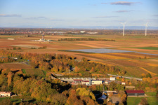 Aerial view of Geothermal power plant Insheim and drilling rig V20 of Vercana GmbH for deep geothermal energy and lithium extraction in front of the Offenbach wind farm, with the GKM Mannheim in the background in Insheim in the state Rhineland-Palatinate, Germany