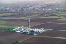 Oblique view of Vulcan Energy's V20 deep drilling site in the evening light at Schleidberg for the extraction of geothermal energy and lithium in Insheim in the state Rhineland-Palatinate, Germany