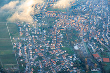 View of the town from the west under clouds in Klingenmünster in the state Rhineland-Palatinate, Germany