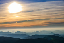 Paragliders over the Wasgau region in the evening in Fischbach bei Dahn in the state Rhineland-Palatinate, Germany