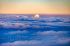 Exhaust fumes from the steam power plant Karlsruhe break through the clouds in the district Daxlanden in Karlsruhe in the state Baden-Wuerttemberg, Germany
