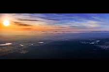 Aerial view of Sunset over winter fog at the Haardt Mountains in the district Speyerdorf in Neustadt an der Weinstraße in the state Rhineland-Palatinate, Germany