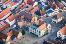 Village square with community center and VR Bank Südpfalz eG branch Ottersheim in Ottersheim bei Landau in the state Rhineland-Palatinate, Germany