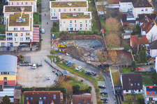 Aerial view of Construction pit for the expansion of the residential complex in the city center in Kandel in the state Rhineland-Palatinate, Germany