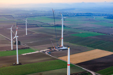 Giant crane for the repowering of the wind farm Minfeld. JUWI is replacing four old turbines (GE 1.5) from 2004 with two new, modern Vestas V162 turbines, each with six MW. in Minfeld in the state Rhineland-Palatinate, Germany from above