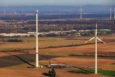 Giant crane for the repowering of the wind farm Minfeld. JUWI is replacing four old turbines (GE 1.5) from 2004 with two new, modern Vestas V162 turbines, each with six MW. in Minfeld in the state Rhineland-Palatinate, Germany viewn from the air