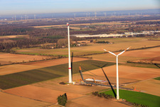 Drone recording of Giant crane for the repowering of the wind farm Minfeld. JUWI is replacing four old turbines (GE 1.5) from 2004 with two new, modern Vestas V162 turbines, each with six MW. in Minfeld in the state Rhineland-Palatinate, Germany