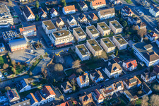 Aerial view of Construction pit for the expansion of the residential complex in the city center in Wörth am Rhein in the state Rhineland-Palatinate, Germany