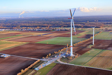 Oblique view of Repowering of the Minfeld wind farm. JUWI is replacing four older turbines (GE 1.5) from 2004 with two new, modern Vestas V162 turbines, each with a capacity of six MW. in Kandel in the state Rhineland-Palatinate, Germany