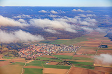 View of the town from the west under clouds in Steinweiler in the state Rhineland-Palatinate, Germany