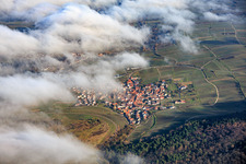 Winegrowing village under clouds from the west in Birkweiler in the state Rhineland-Palatinate, Germany