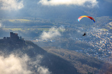 Trifels Castle with paraglider in clouds in Annweiler am Trifels in the state Rhineland-Palatinate, Germany