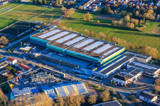Almost completed new building of the logistics park by HANSAINVEST and DFI-Real-Estate Kandel for FRISCHEPLATTFORM SÜDWEST of Gemüsering Stuttgart GmbH in the district Minderslachen in Kandel in the state Rhineland-Palatinate, Germany viewn from the air
