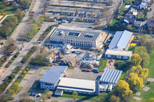 Demolition of the old town hall Offenbach an der Queich between fire station, municipal daycare center Queichhüpfer and new town hall building in Offenbach an der Queich in the state Rhineland-Palatinate, Germany