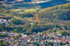 Historic mine headframe Le puits Cuvelette Nord and Saint-Maurice Church in the district Cité de la Chapelle in Freyming-Merlebach in the state Moselle, France