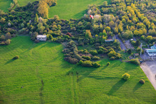 Paragliders over the hangars at the former military airfield Grostenquin in Bistroff in the state Moselle, France