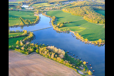 Bridge over the lake Etang du Welschhof in Puttelange-aux-Lacs in the state Moselle, France