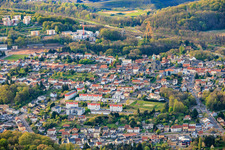 City view from the south in front of the historic mine headframe Le puits Cuvelette Nord in the district Cité de la Chapelle in Freyming-Merlebach in the state Moselle, France
