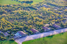 Paragliders over the hangars at the former military airfield Grostenquin in Bistroff in the state Moselle, France