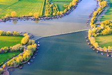 Bridge over the lake Etang du Welschhof in Puttelange-aux-Lacs in the state Moselle, France