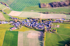 Village view from the north with round village pond and St. Mauritius Church. in the district Burglemnitz in Remptendorf in the state Thuringia, Germany