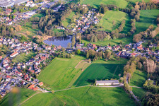 Village view with heart-shaped mill pond from the north in the district Schierschnitz in Föritztal in the state Thuringia, Germany
