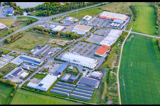 Industrial area Haßfurt-East Robert-Bosch-Straße with RENO, OBI and E center Frischemarkt Meyer in the district Kleinaugsfeld in Haßfurt in the state Bavaria, Germany