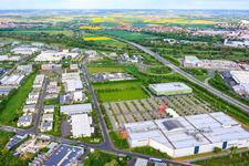 Maintal industrial park with a giant red chair in the parking lot of XXXLutz Neubert Schweinfurt and mömax Schweinfurt in the district Oberndorf in Schweinfurt in the state Bavaria, Germany