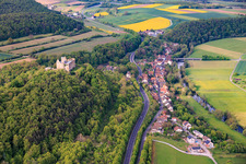Village view in the valley of the Franconian Saale from the northeast with Trimburg in the district Trimberg in Elfershausen in the state Bavaria, Germany