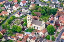 Cemetery and church square with St. Vitus in the district Langendorf in Elfershausen in the state Bavaria, Germany