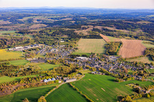 Village view from the north with the Frankenwald agricultural cooperative. in Lehesten in the state Thuringia, Germany
