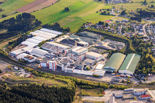 Industrial park at the train station with Wiegand-Glashüttenwerke GmbH and Bayerische Flaschen-Glashüttenwerke Vertriebs-GmbH in Steinbach am Wald in the state Bavaria, Germany